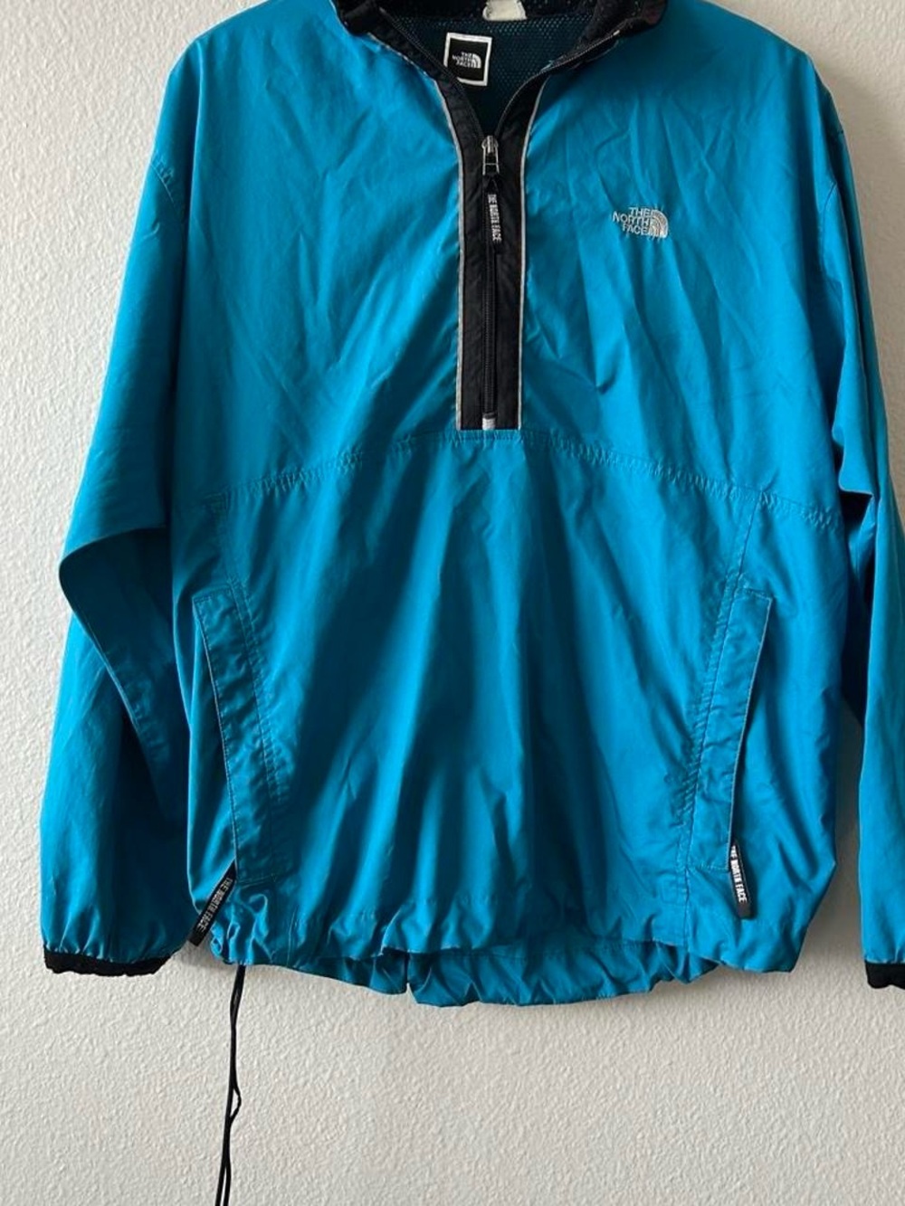 The North Face women’s Teal Half-Zip Windbreaker